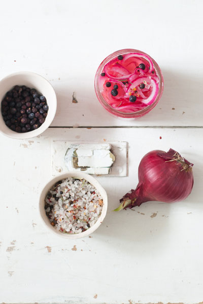 pickled red onions and peppercorns