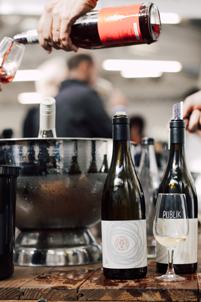 publik wine pouring wine tasting