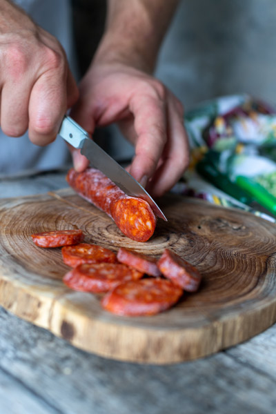 slicing chorizo