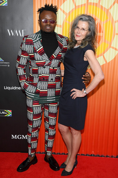 CEO and founder, Lorna Scott with South African entertainer, Tresor at the recent CTAOP charity event, hosted by Charlize Theron CEO and founder, Lorna Scott with South African entertainer, Tresor at the recent CTAOP charity event, hosted by Charlize Theron