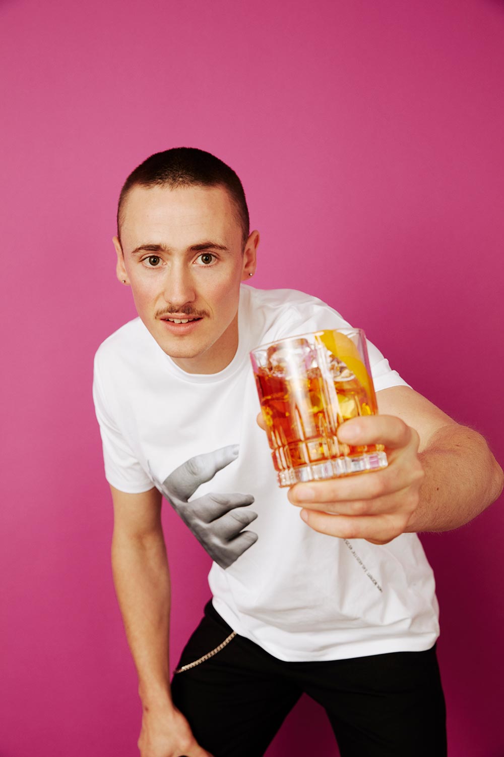 Whisky drinker raising his glass