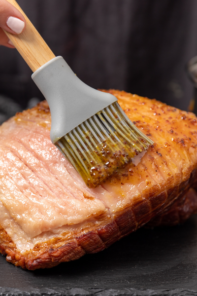 brushing glaze onto gammon