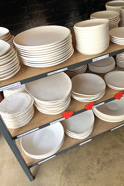 selecting ceramics at Clay Café Paarl