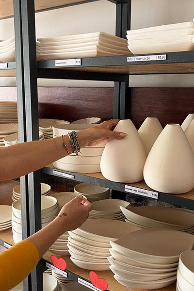 selecting ceramics at Clay Café Paarl